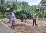 Satgas TMMD 127 dan Warga Sambuli Bahu-Membahu Ratakan Jalan Jembatan