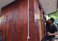 Satgas TMMD Kodim 1710/Mimika Laksanakan Pengecatan MCK Umum di Kampung Keakwa